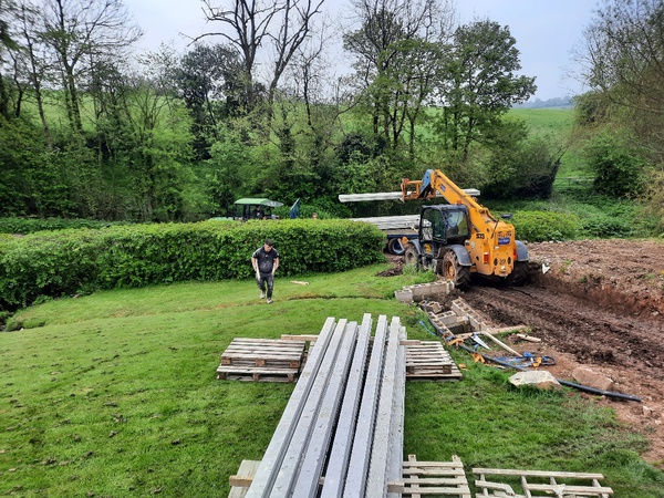 Unloading the beams from Washpool Lane